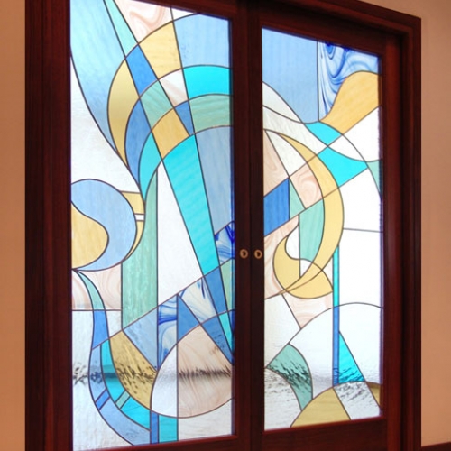 Porte vetrate moderne scorrevoli nel muro