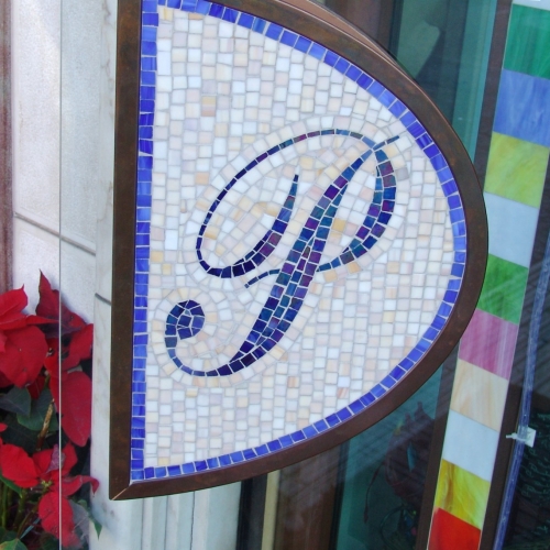 Maniglione di apertura con mosaico